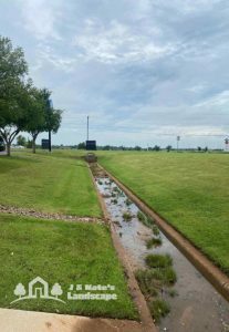 Norman Commercial Yard Debris Removal Before